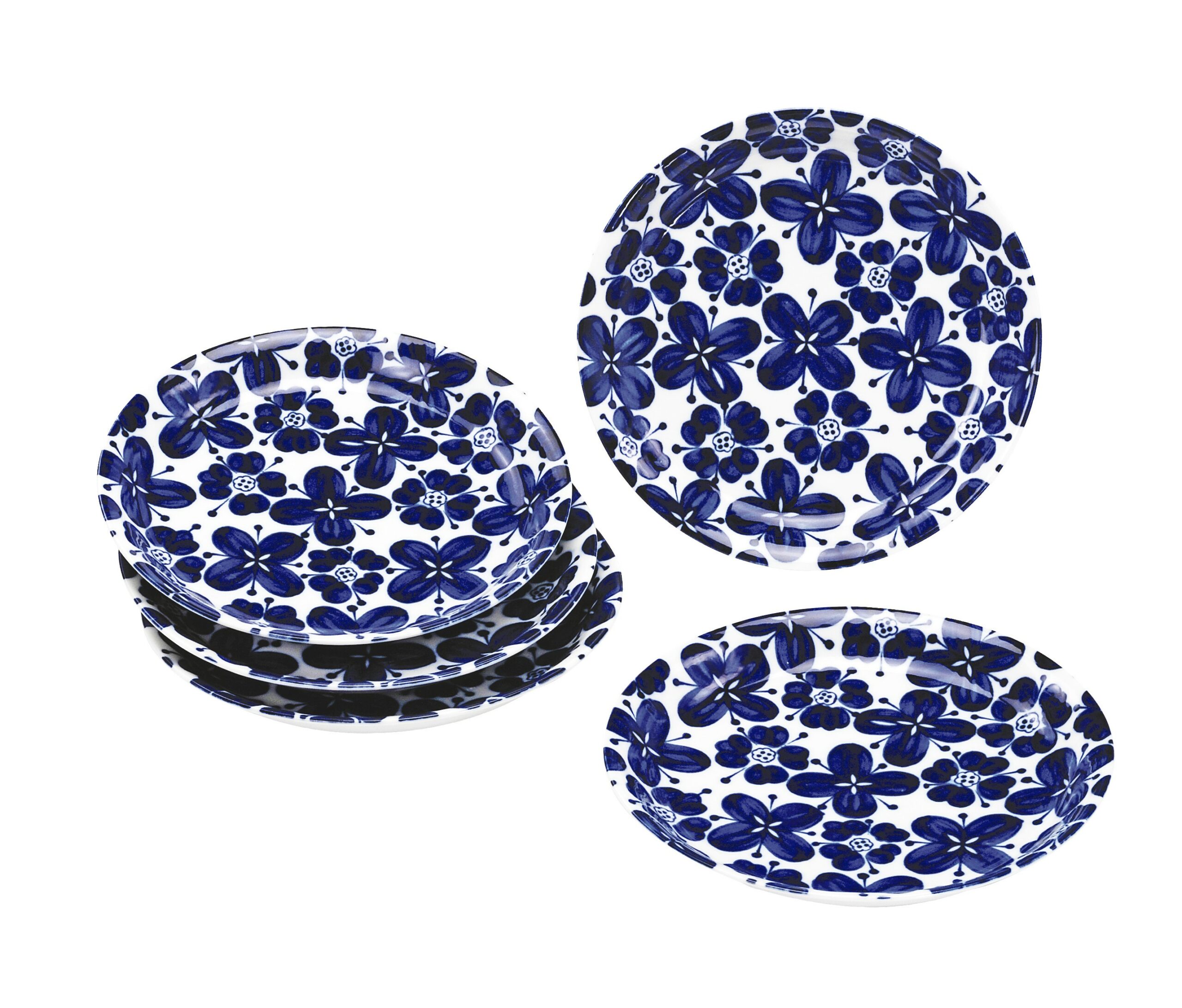 Set de cinq assiettes japonaises en céramique bleue décorées de motifs floraux